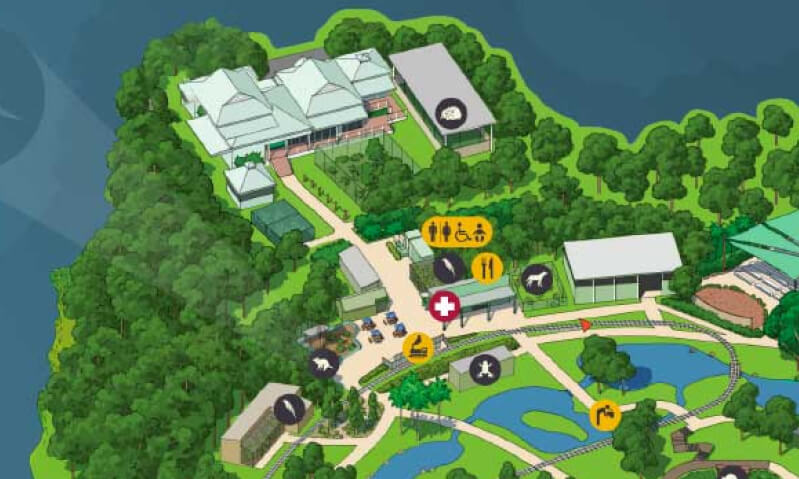 A detailed zoo map featuring a large park area surrounded by numerous trees, highlighting various animal exhibits