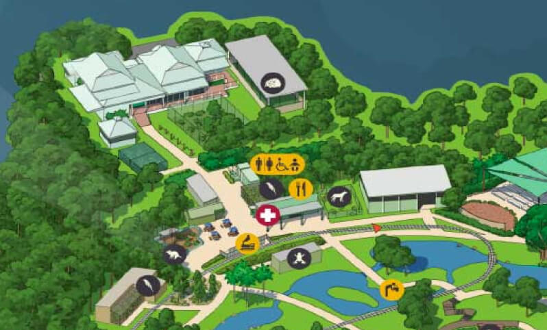 A detailed zoo map featuring a large park area surrounded by numerous trees, highlighting various animal exhibits
