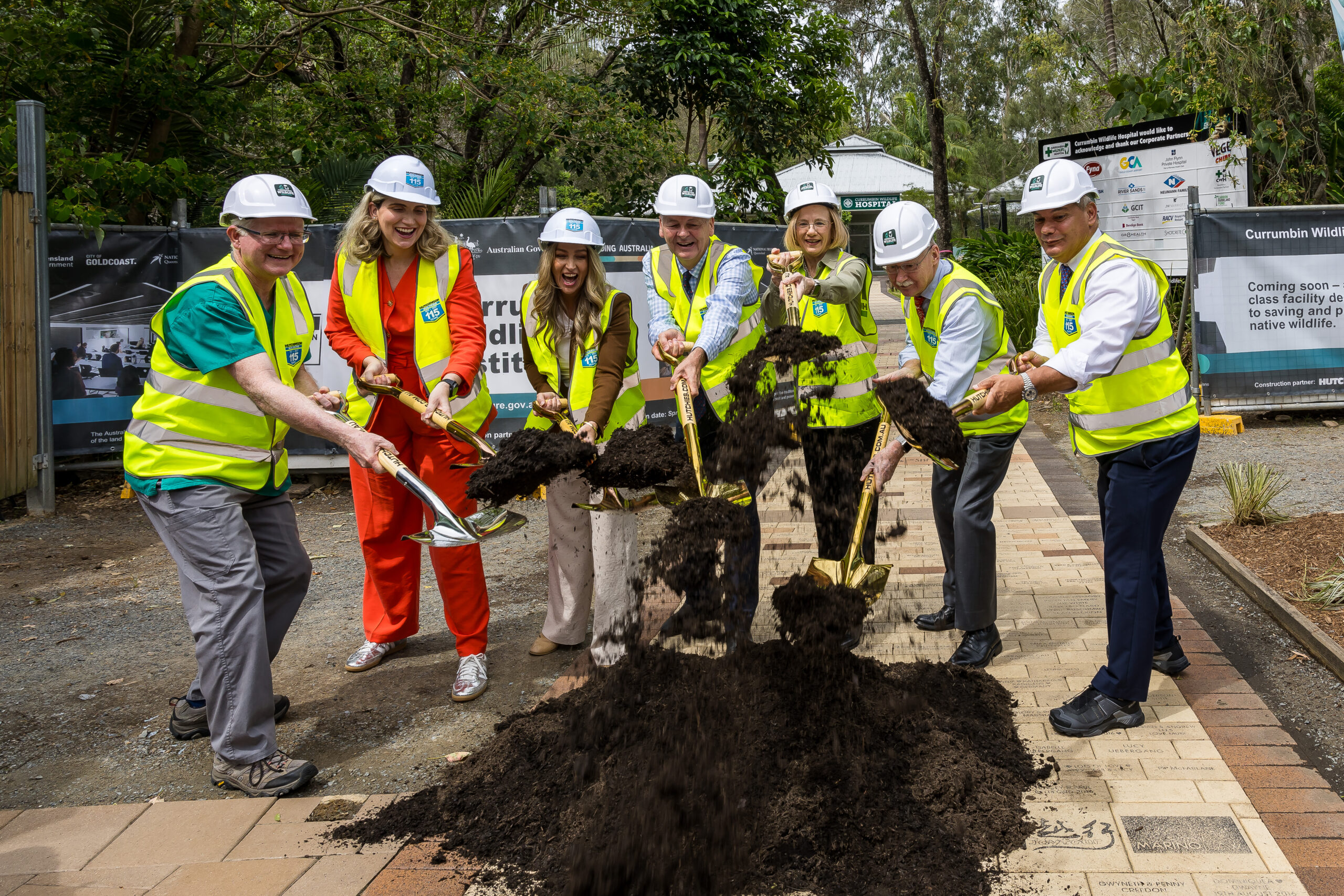 Senior Vet Dr Michael Pyne and NTAQ President Mark Townsend join key government stakeholders to turn the first sod for the world‑class Currumbin Wildlife Institute.